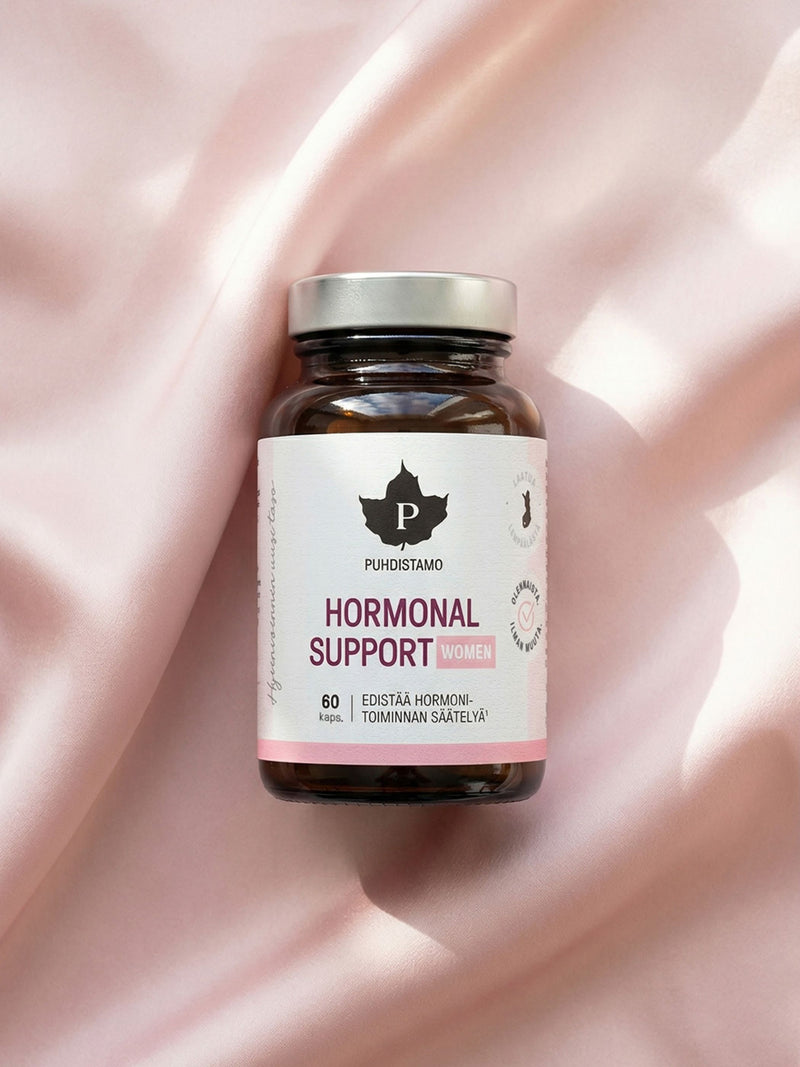 Puhdistamon Hormonal Support purkki vaalenpunaisen kankaan päällä
