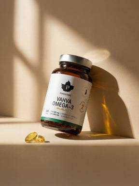 Puhdistamon Vahva Omega-3 140 kapselipurkki nojaa seinään