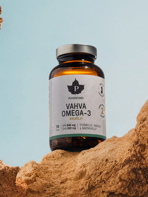 Puhdistamon Vahva Omega-3 kalaöljykapselipurkki kallion päällä