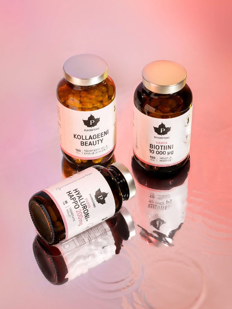 Puhdistamon Beauty Box tuotteet - Kollageeni beauty, Biotiini ja hyaluronihappo kapselipurkit vaaleanpunaisella taustalla